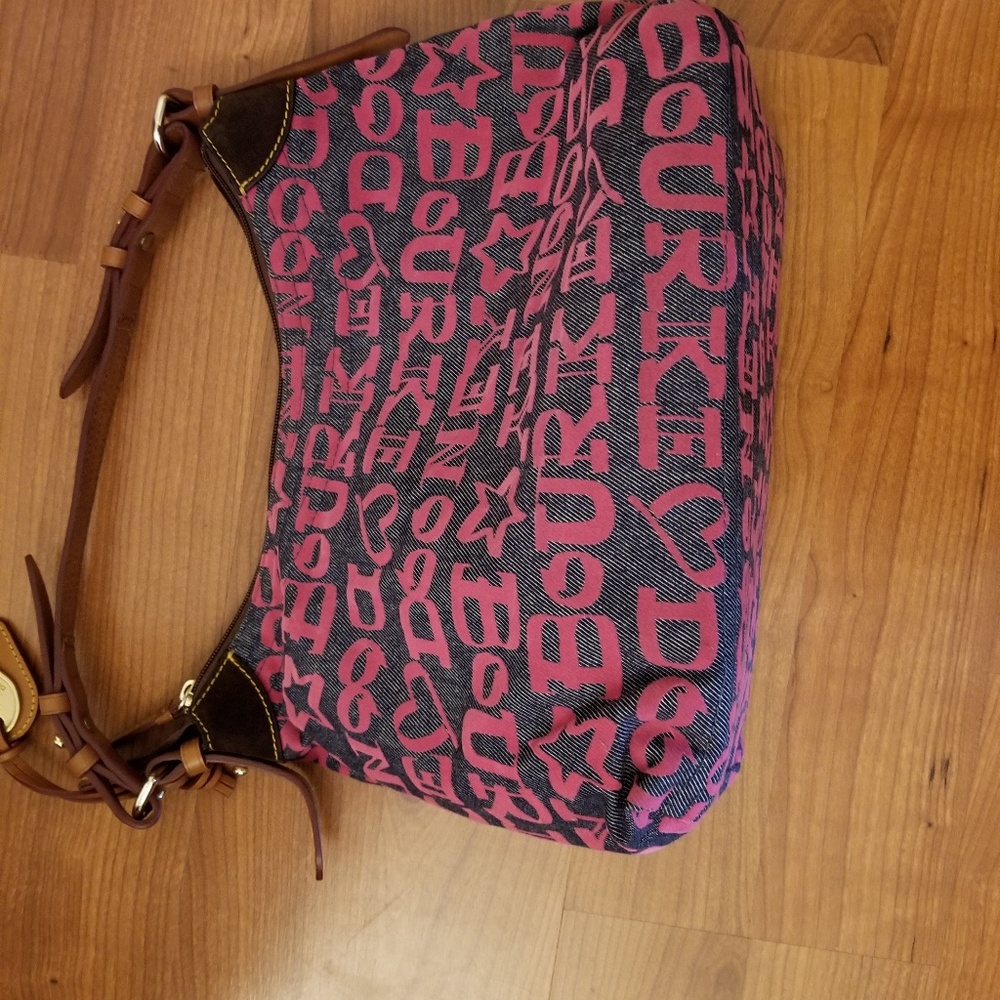 Used Dooney&B Jean's bag with D&B inscription.